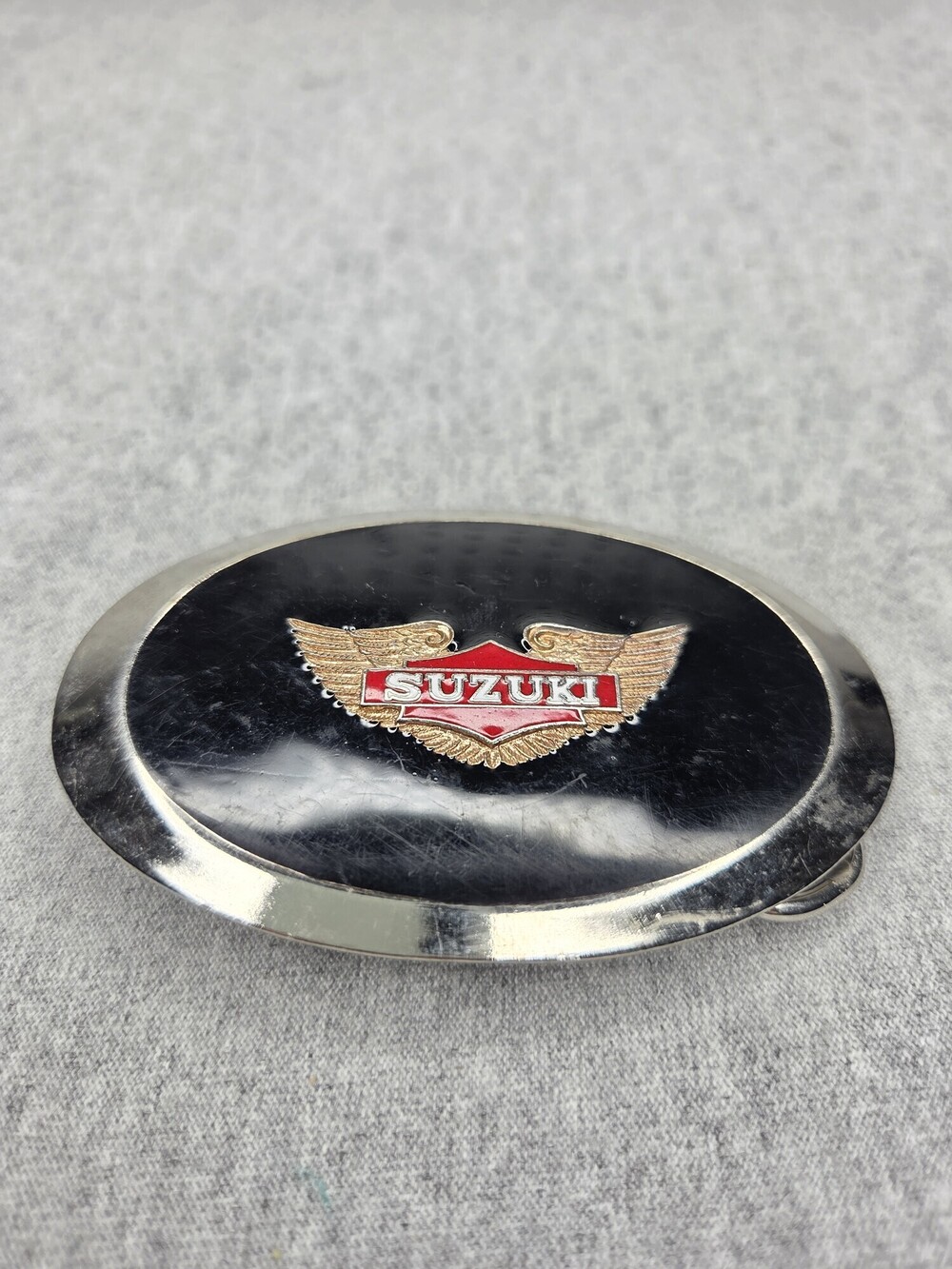 Vintage 1970s Suzuki Motorcycle Belt Buckle Enamel Winged Logo Oval Biker